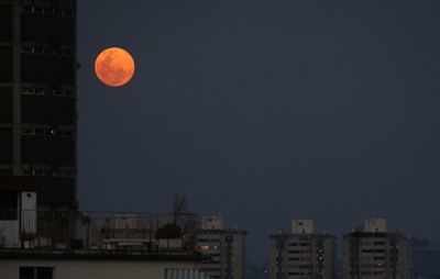 Pink moon: Largest supermoon of 2020 rises on a world battling COVID-19