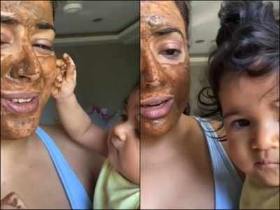 Sameera Reddy's daughter playing with her face mask is too cute to be missed
