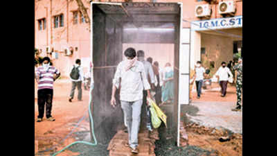 Telangana: Mad rush for disinfection kiosks, expert says no to bleaching agent