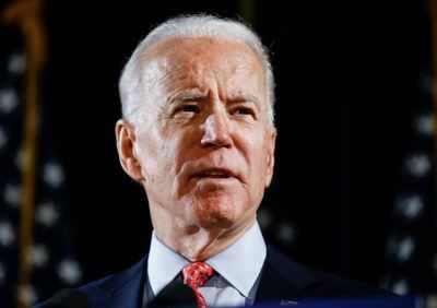 Drowned out by pandemic, a muted victory for Joe Biden - Times of India