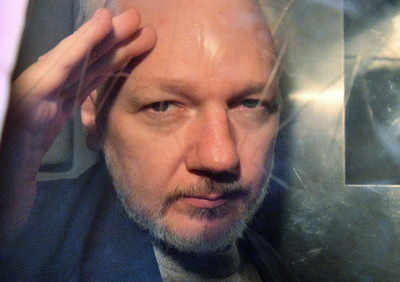Julian Assange 'secretly fathered two children', says his partner