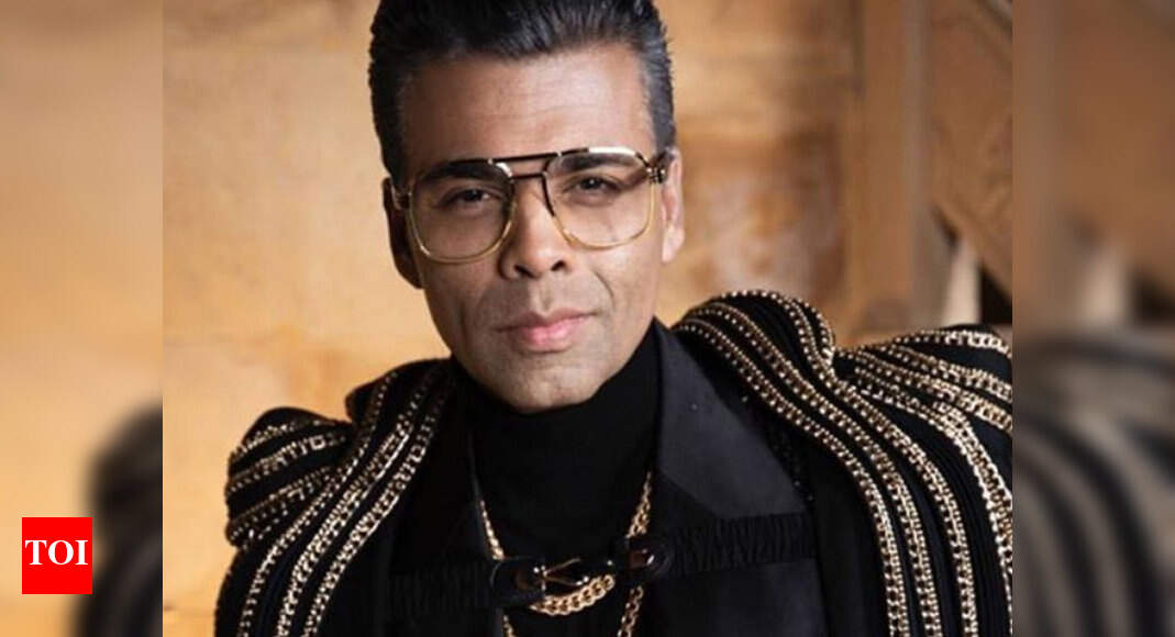 Karan Johar shows off his new salt and pepper look in a cool selfie