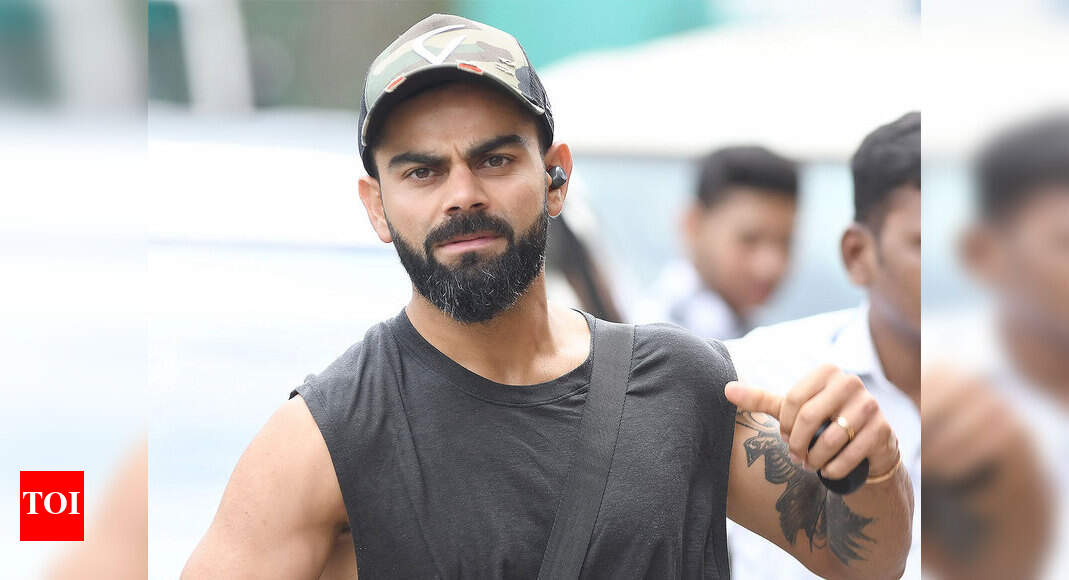 COVID19 Virat Kohli starts trim at home challenge Off the field News Times of India
