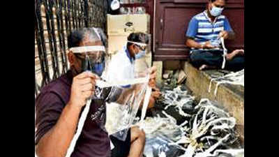 Schoolmates join hands with artisans to prepare face shields for Kolkata doctors