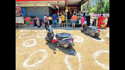 Small window to buy ration spurs mad rush in Pune