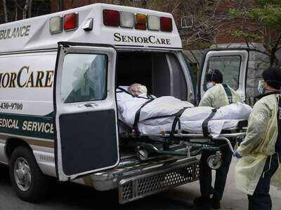 johns hopkins ambulance deaths covid global loaded cobble workers emergency patient outside medical hill health during center into th read