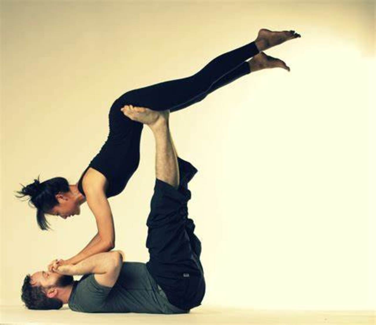 two flexible gymnast child girl show athletic skills on white studio  background Stock Photo - Alamy
