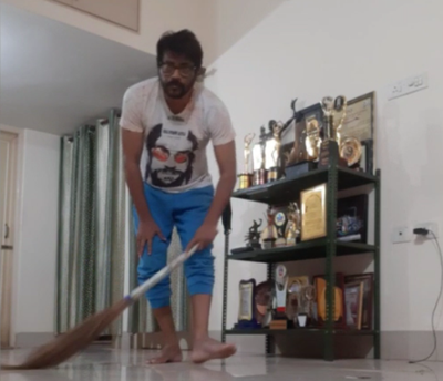 Why is Manoj Mishra mopping floors?