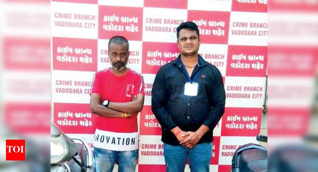 Cops arrest duo for ferrying liquor | Vadodara News - Times of India
