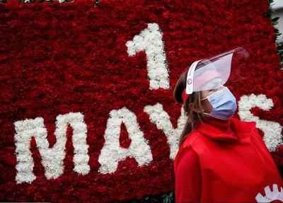 Coronavirus lockdowns scale back May Day rallies