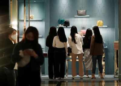 South Koreans roar back to malls as coronavirus curbs ease
