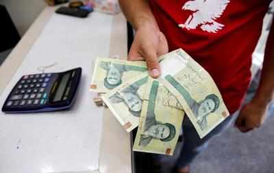Iran approves plan to cut four zeros from falling currency: Report