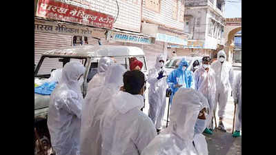 Cops don PPE kits to shift people from narrow lanes in Rajasthan