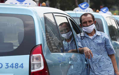 Indonesia eases coronavirus travel ban despite fears it's too early