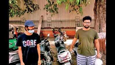 Two crash scooter into policemen, held | Vadodara News - Times of India