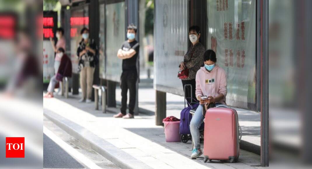 Local official sacked as coronavirus epicentre Wuhan reports six new cases - Times of India