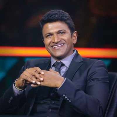 Puneeth Rajkumar interacts with a different-abled fan