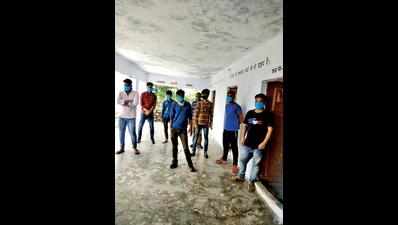 Migrant workers quarantined at govt school volunteer to revamp it