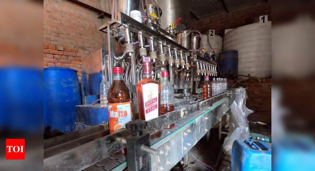 liquor manufacturing unit:  Punjab: Illicit liquor manufacturing unit busted in Rajpura | Chandigarh News - Times of India