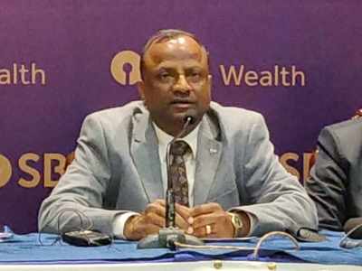 Economy can't be locked down for long, have to live with Covid: SBI chairman