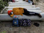 In pics: Stranded migrant workers desperate to return home