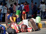 In pics: Stranded migrant workers desperate to return home