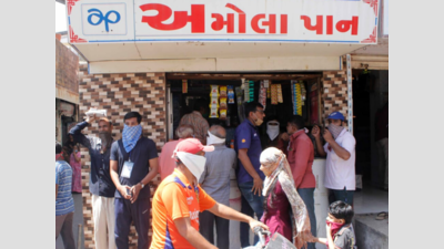 Rajkot market opens, long queues at paan and fafda shops