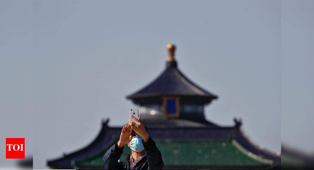 China reports 16 new coronavirus cases - Times of India