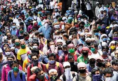 Migrant workers wait for hours at CSMT for trains to Bihar on Tuesday