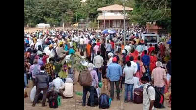 Mumbai: Thousands of migrants gather at grounds in Kandivali in hope of boarding trains
