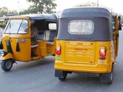 Auto rickshaw moving on the road, Chennai, Tamil Nadu, India Stock