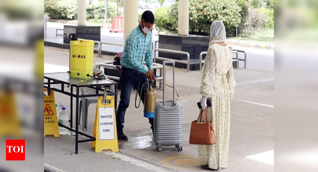 Social distancing up in smoke as Amausi airport comes alive | Lucknow ...