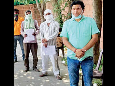 P S Gahlot (in jeans) with his staff
