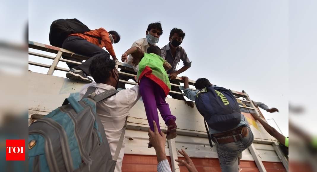 in-photos-migrant-workers-across-india-journey-back-home