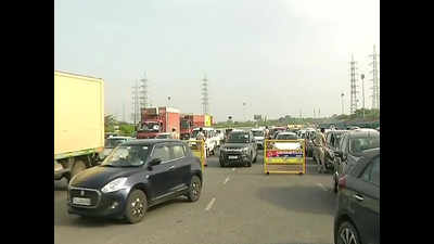 Heavy traffic movement at Delhi-Gurugram border; police check passes, IDs of commuters