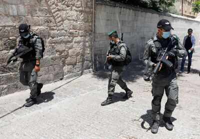 Members of the Israeli security forces patrol in the area where Israeli police in annexed east Jerusalem reportedly shot dead a Palestinian with special needs (AFP)