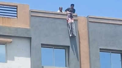 Surat: Girl hanging from apartment terrace rescued
