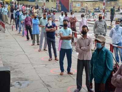 People queue up for booking railway reservation tickets in Jalandhar on Sunday. (Photo: PTI)