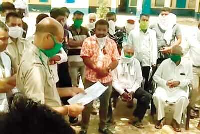 A cop takes stock of situation at Nathara village in Udaipur on Tuesday