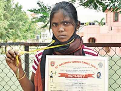 Archer Sonu Khatoon sports her medal and certificate along with the cheque she received on Tuesday.