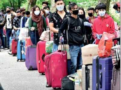 Hundreds of migrant workers from Nagaland gathered at Palace Grounds in Bengaluru on Tuesday and waited patiently for travel confirmation.