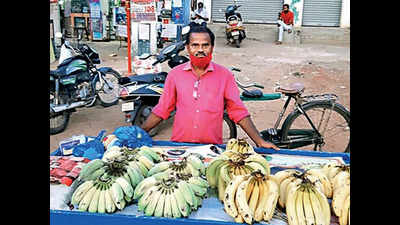 Andhra Pradesh: Laid off, teacher sells bananas to make ends meet