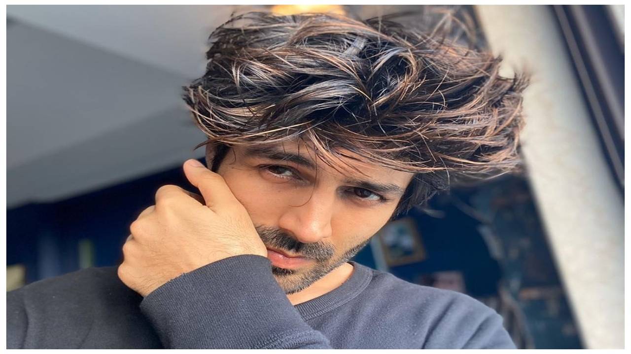 During the lockdown, Kartik Aaryan grew his hair, cropped it short and grew  it back again. Several hairstyles later, the 29-year-old acto... | Instagram