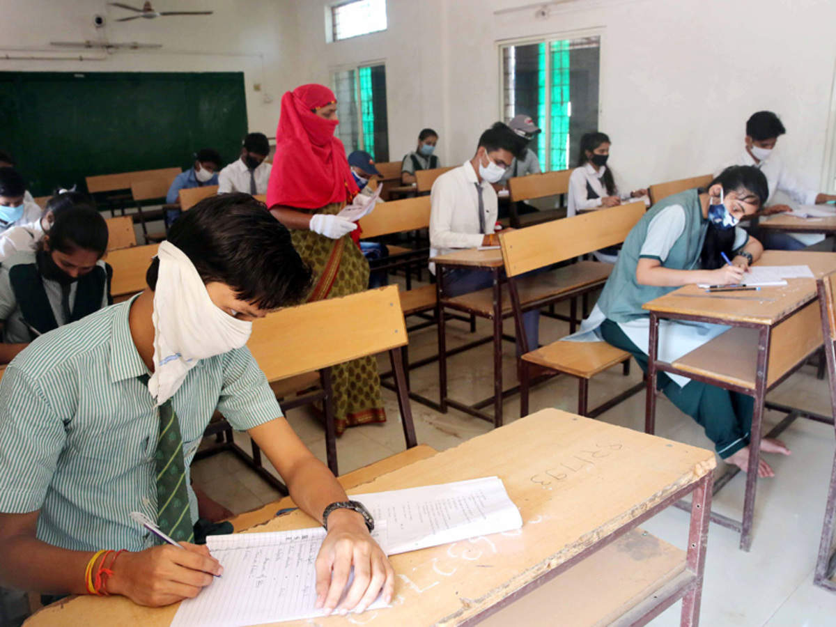 Covid-19 pandemic: HRD working on plan to reduce syllabus for schools | India News - Times of India