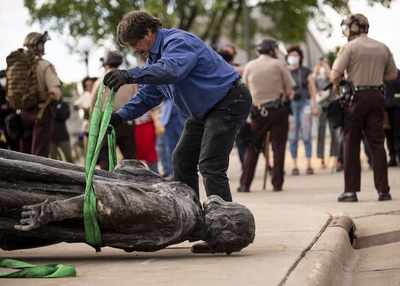 Anti-racism protests sweep the US leaving toppled Columbus statues in their wake