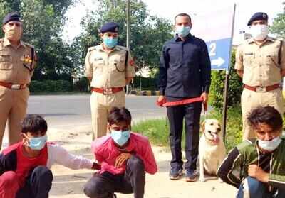 The murder accused in police custody.