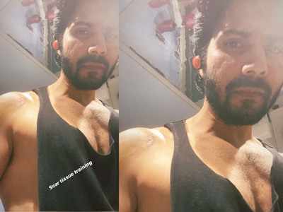 Varun Dhawan gives an intense look post his workout session; captions, 'scar tissue training'