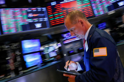 Dow sinks 1,800 as virus cases rise, deflating optimism