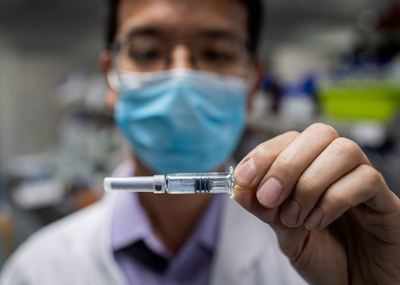China reports 57 new virus cases, highest daily count since April