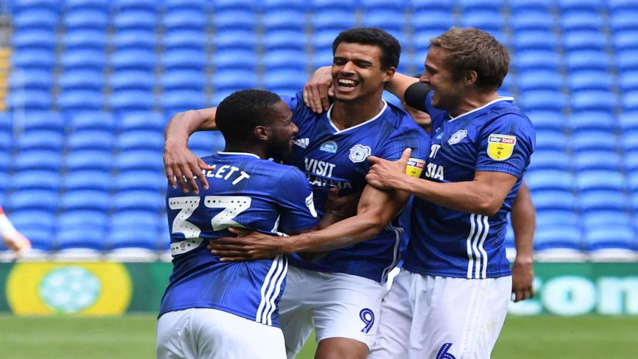 Cardiff City resolve to beat the drop after emotionally-charged victory  over Bournemouth